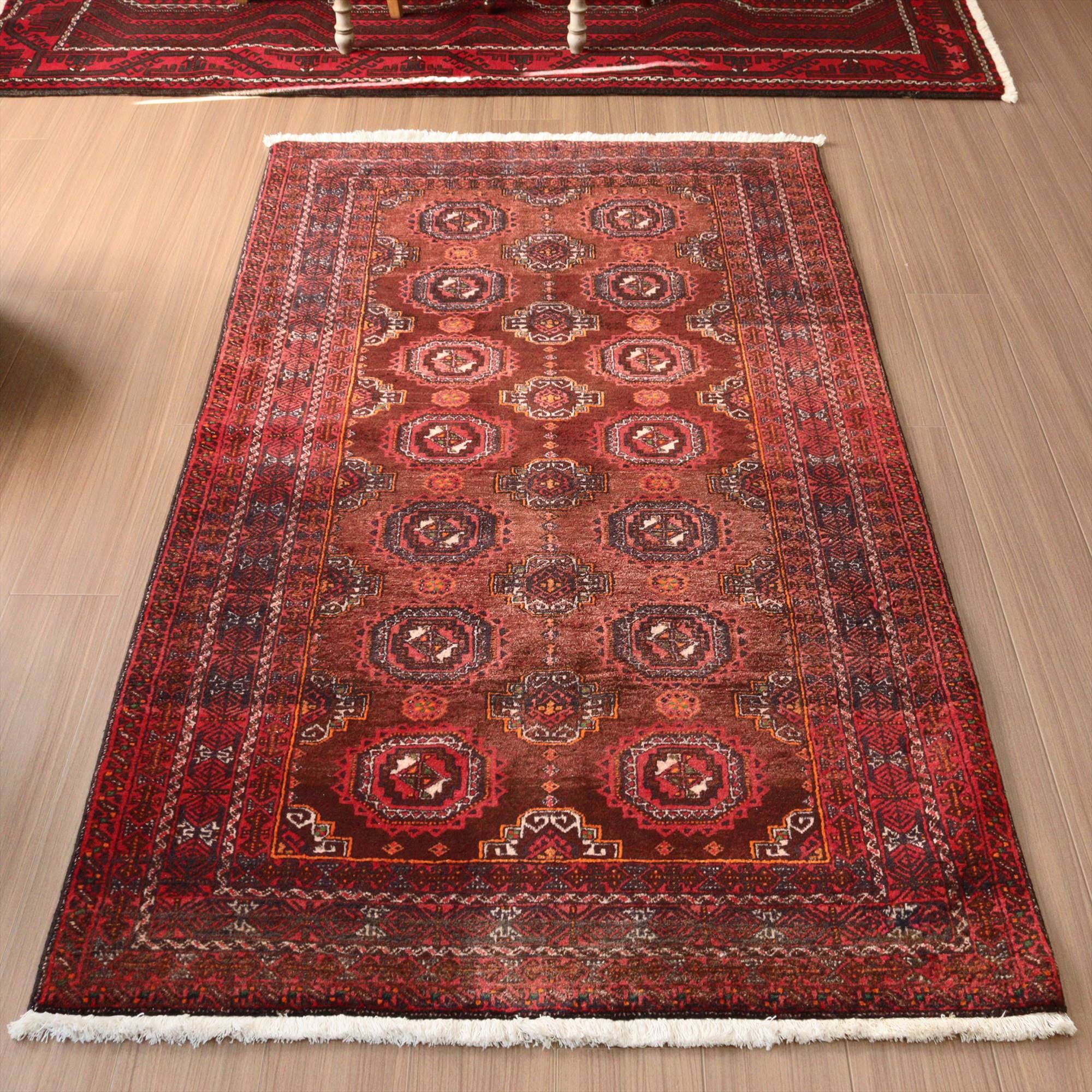 バルーチ族の絨毯204×111cm 連なるギュル文様