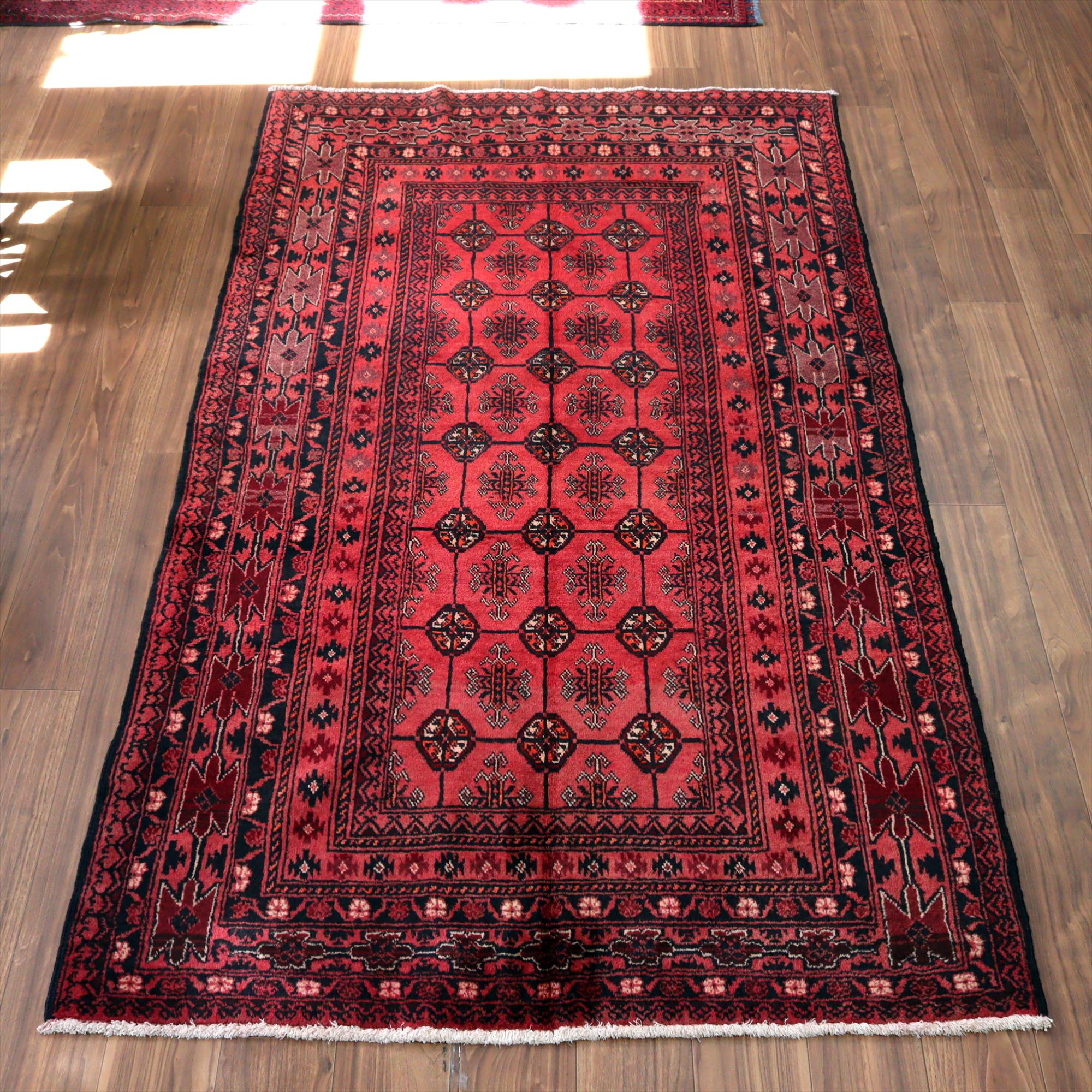 イランの手織り絨毯 バルーチ221×133cm 連なる幾何学模様 レッド