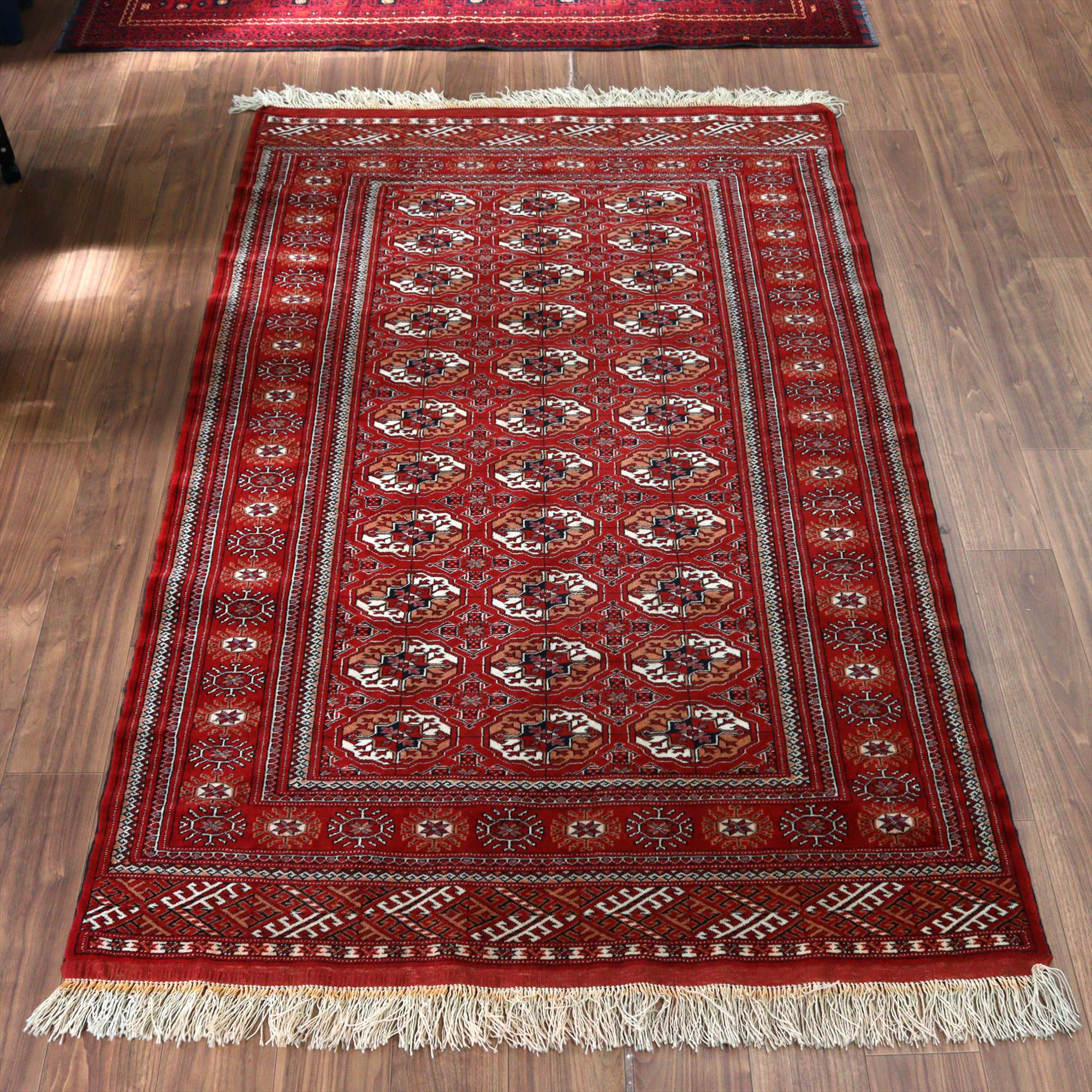 トルクメン族の絨毯 トライバルラグ208×134cm 連なるギュル文様 手織りラグ