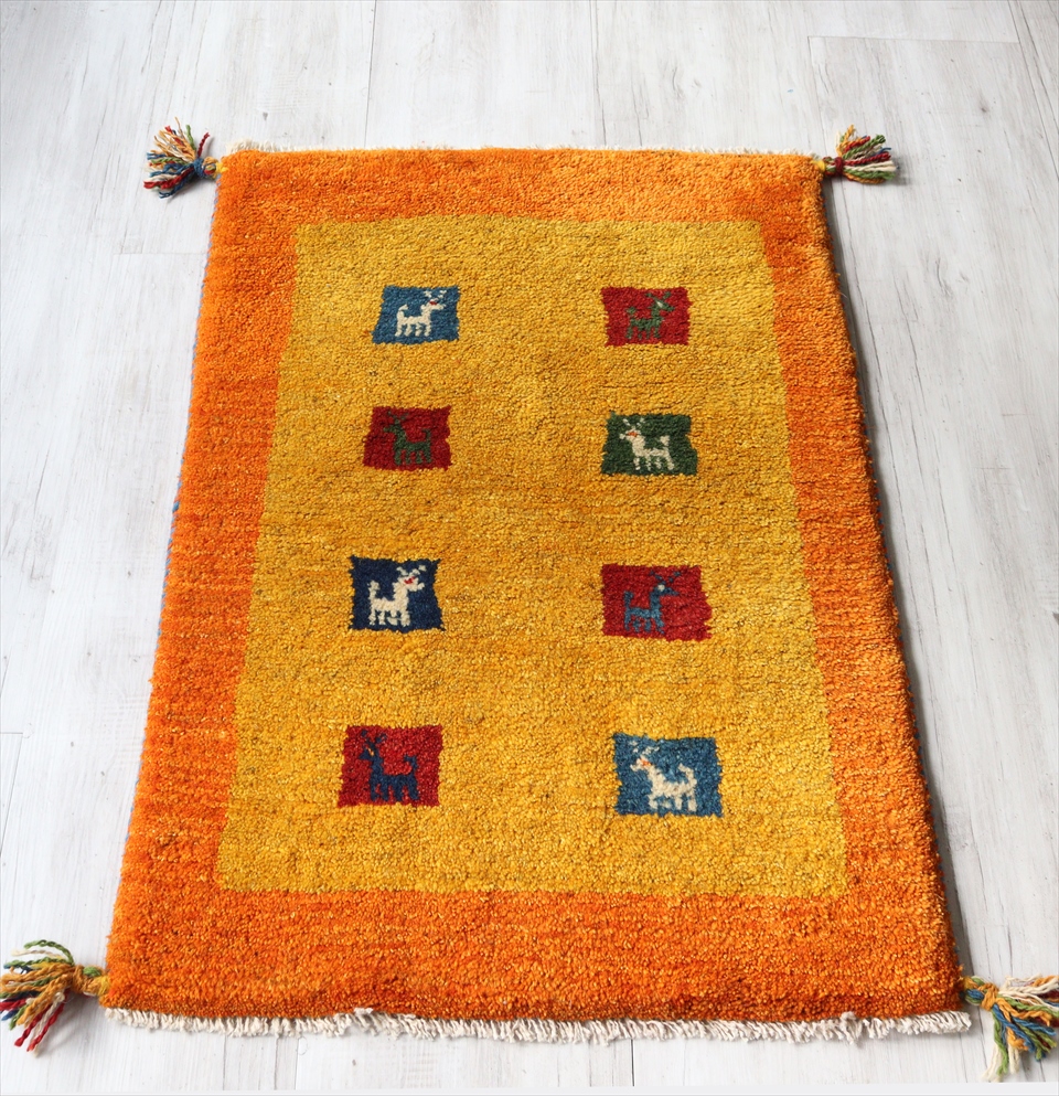 ラグ・ギャッベ（ギャベ）カシュカイ族の手織りラグ・玄関マットサイズ90×60cm イエロー/オレンジ　カラフルタイル　動物モチーフ