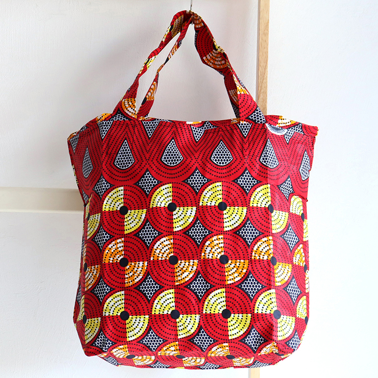 パーニュ アフリカンプリント 巾着タイプのエコバッグ 赤い円盤 Pagne West African Fabric